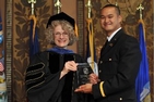 2nd Lt. Daniel Gogue, SIS/BA �13, and Interim Vice Provost for Undergraduate Studies Virginia Stallings at the Hoya Battalion graduation ceremony.  Photo courtesy of U.S. Patriot Photography.